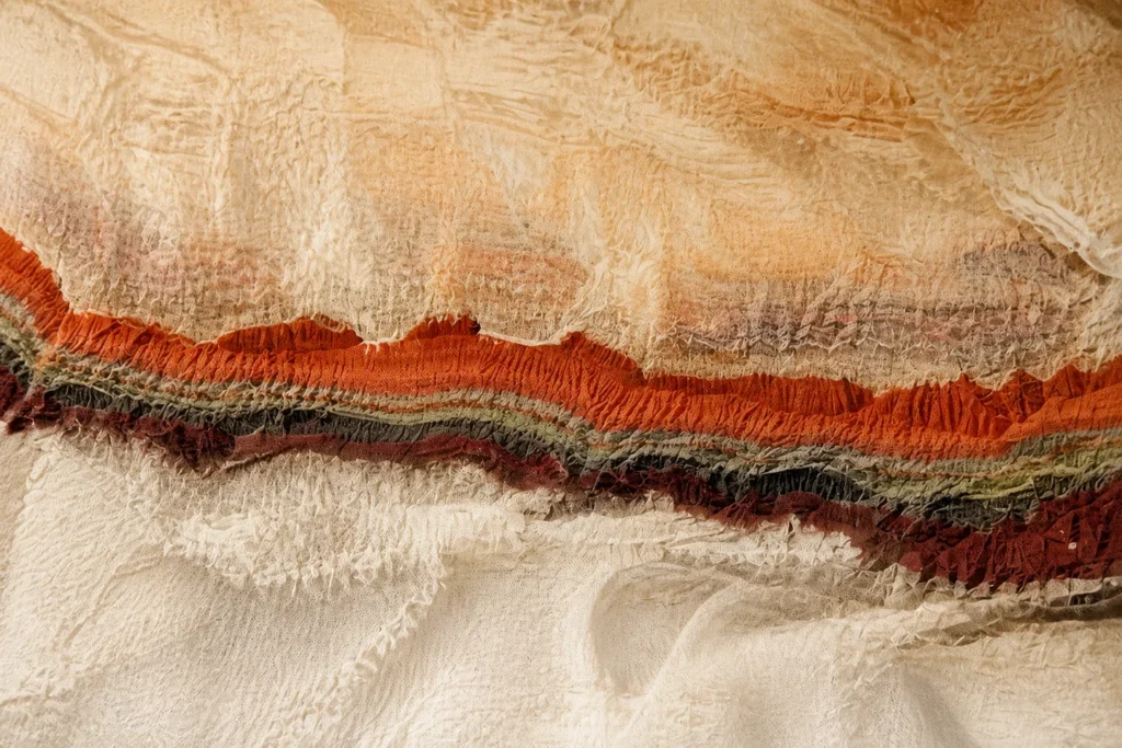 Layered warm textile application visual for warming polyester staple fiber